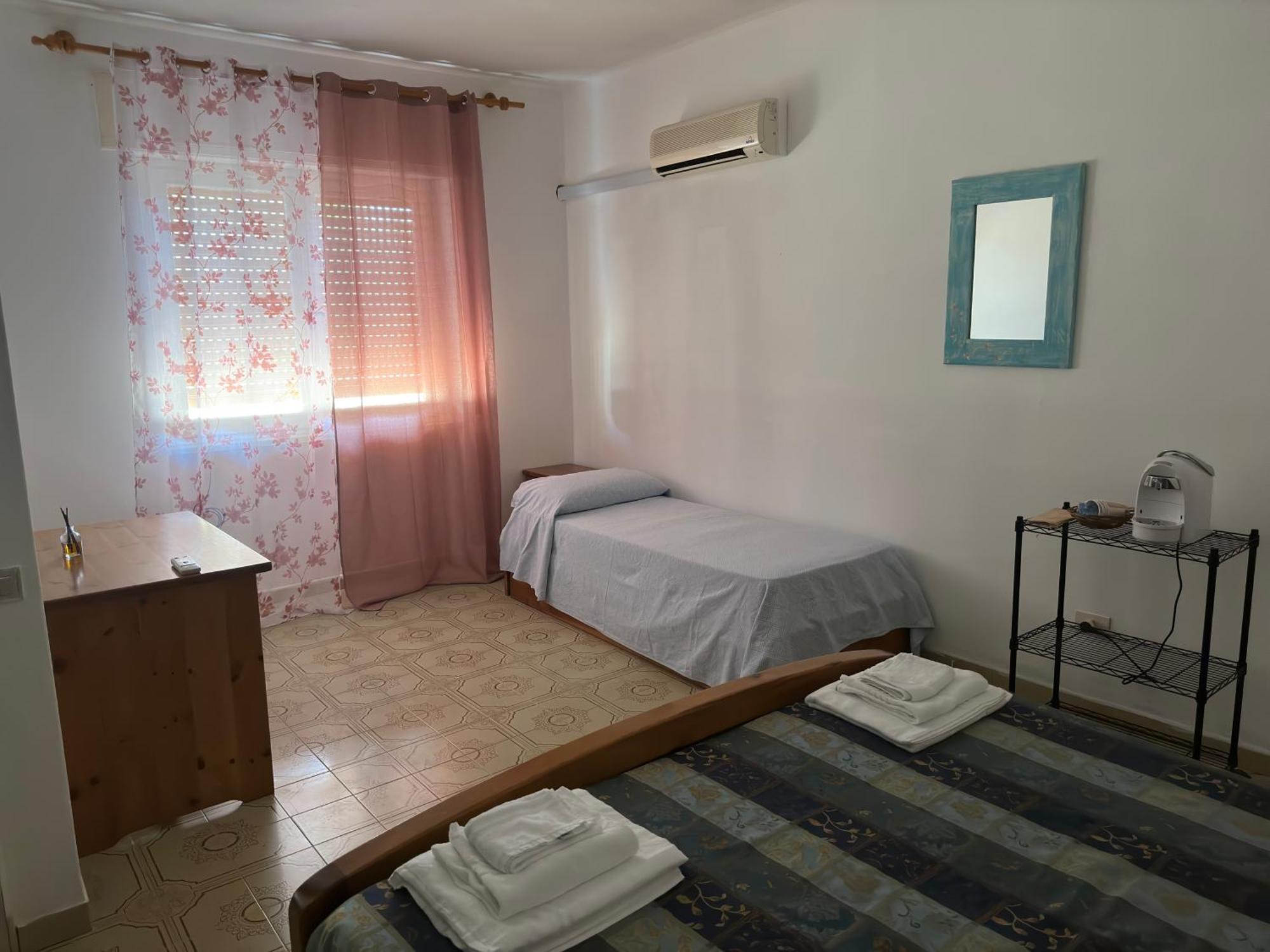 Aparthotel Le Stanze Del Mare Golfo Aranci Habitación foto