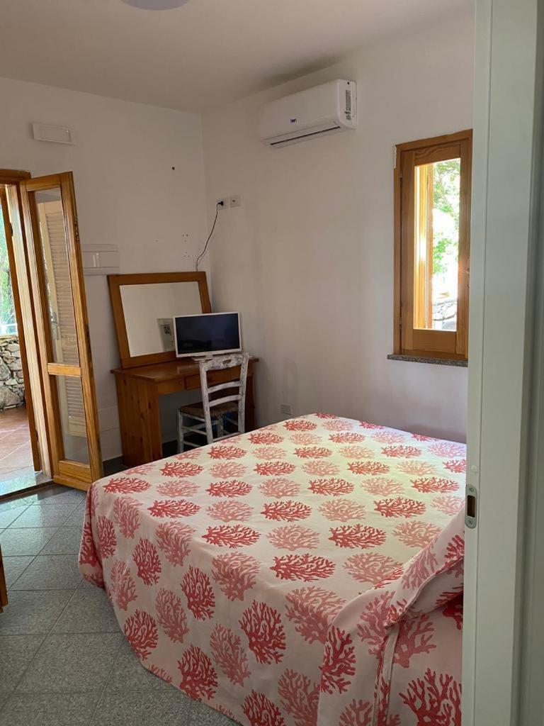 Aparthotel Le Stanze Del Mare Golfo Aranci Habitación foto